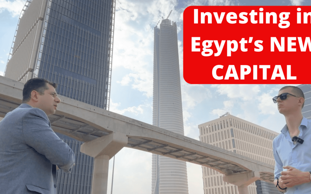 view of two men and tallest tower in africa in new administrative capital cairo