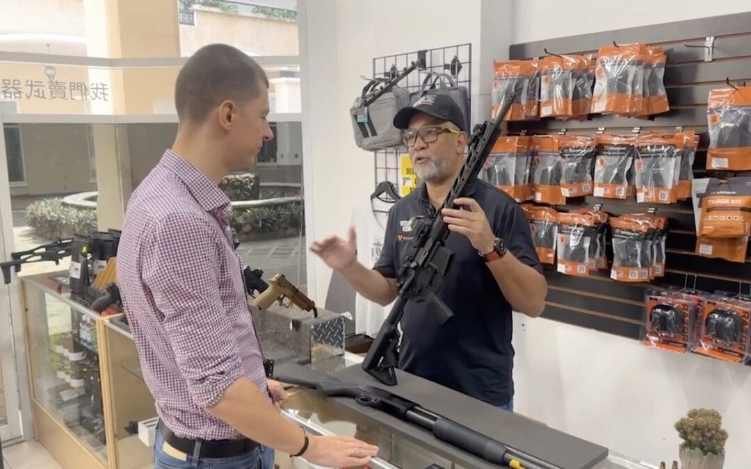 ladislas and man in gun shop panama city
