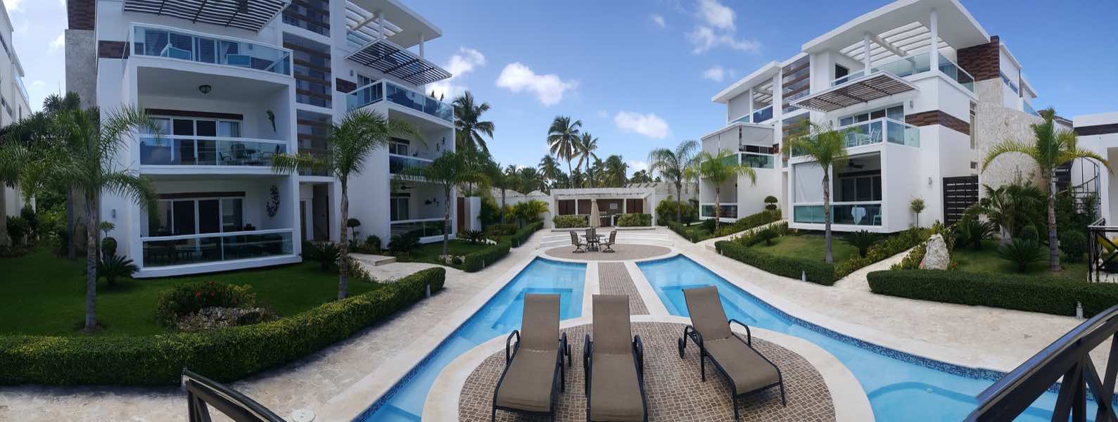 Playa del Carmen Airbnb Investment- view of condos and pool
